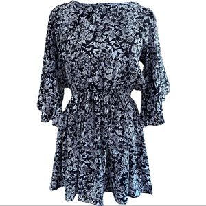 Olivaceous • Black & White Floral Open Back Mini Dress
